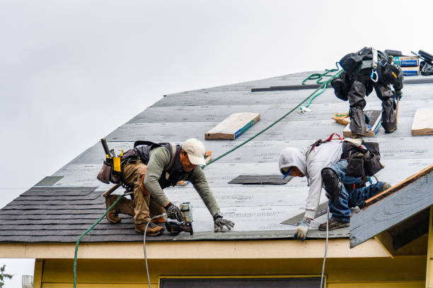 Professional Gutter Installation technician working in Minetto, NY